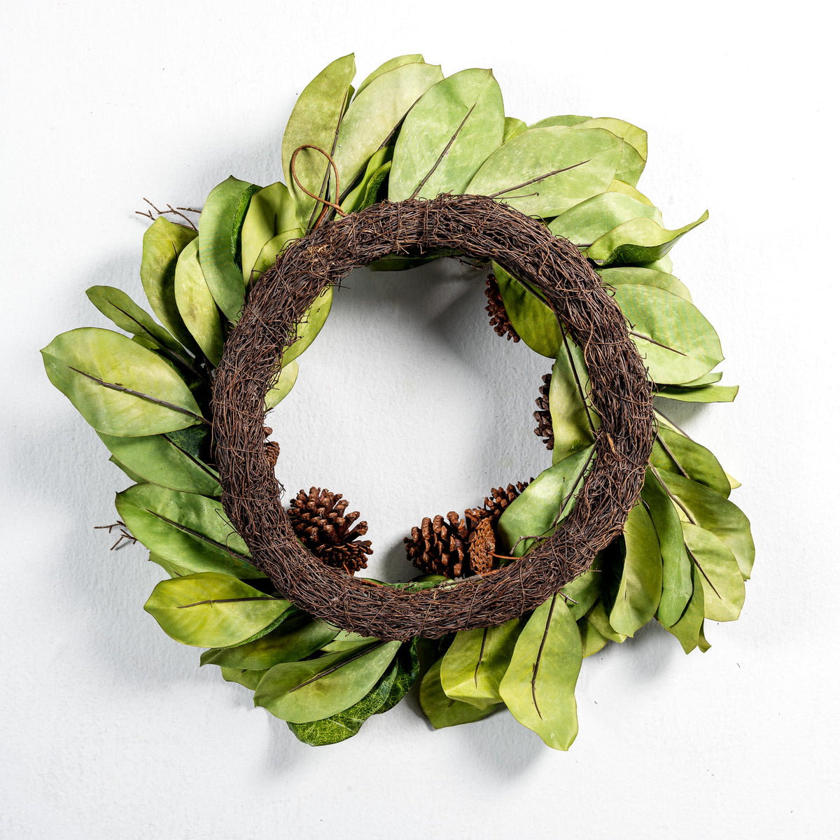 29" Magnolia leaf pine cone and twig wreath