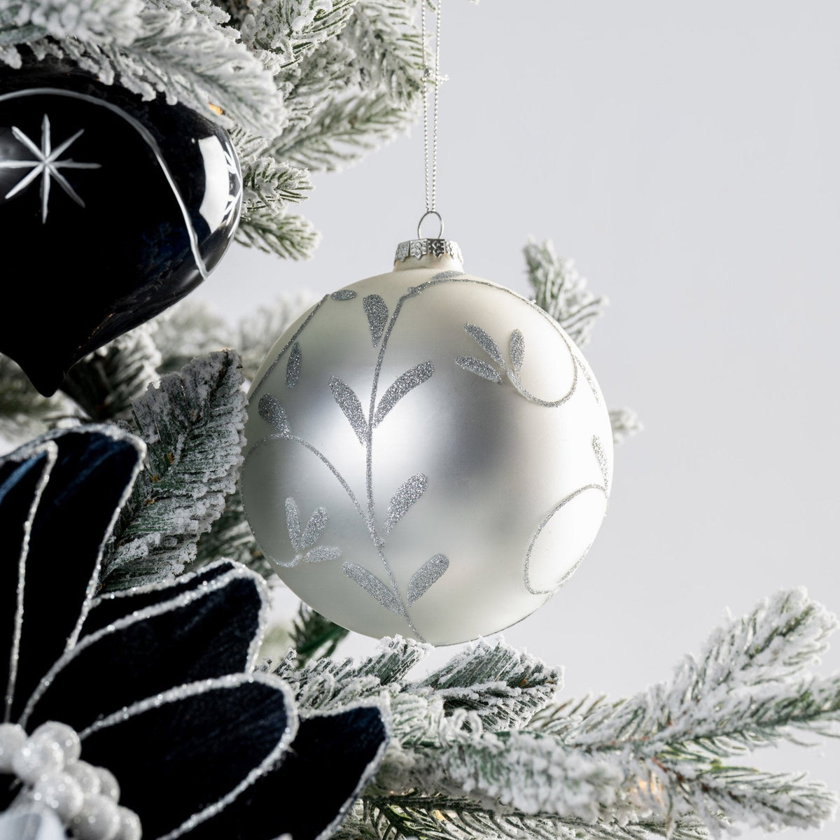 Frosted Glass Ornament with Silver Leaf Motif